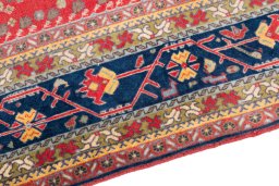 Backside of handmade 1984s Ghashghai rug showing knot structure and weave density