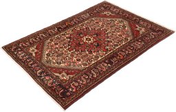 Corner detail of 1940s Hamedan rug showing border pattern and Wool pile