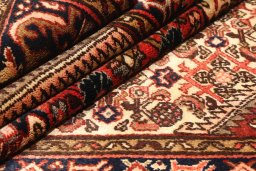 Close-up detail of 1940s Hamedan rug from Iran / Persia showing Wool weave