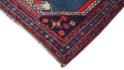 Surface texture of 1950s Hamedan rug with natural Wool and intricate pattern