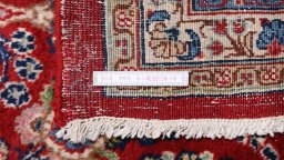 Corner detail of 1910s Hamedan rug showing border pattern and Wool pile