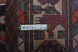 Close-up detail of 2000s Hamedan rug from Iran / Persia showing Wool weave