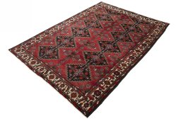 Corner detail of 2000s Hamedan rug showing border pattern and Wool pile