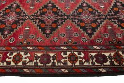Close-up detail of 2000s Hamedan rug from Iran / Persia showing Wool weave