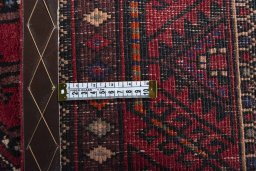 Close-up detail of 2000s Hamedan rug from Iran / Persia showing Wool weave