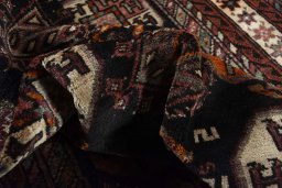 Corner detail of 2000s Hamedan rug showing border pattern and Wool pile