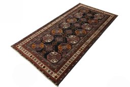Corner detail of 2000s Hamedan rug showing border pattern and Wool pile