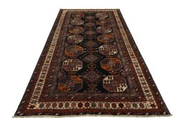 Surface texture of 2000s Hamedan rug with natural Wool and intricate pattern