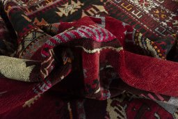 Surface texture of 2000s Hamedan rug with natural Wool and intricate pattern