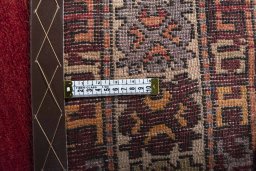 Backside of handmade 2000s Hamedan rug showing knot structure and weave density