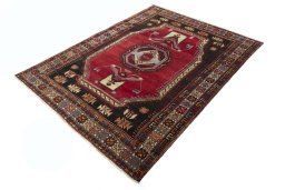 Corner detail of 2000s Hamedan rug showing border pattern and Wool pile
