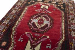 Backside of handmade 2000s Hamedan rug showing knot structure and weave density