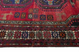 Corner detail of 2000s Hamedan rug showing border pattern and Wool pile