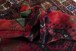 Surface texture of 2000s Hamedan rug with natural Wool and intricate pattern