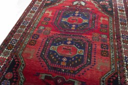 Backside of handmade 2000s Hamedan rug showing knot structure and weave density