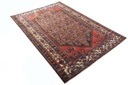 Close-up detail of 2000s Hamedan rug from Iran / Persia showing Wool weave