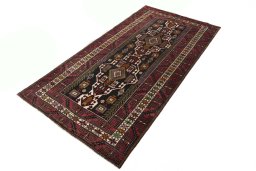 Corner detail of 2000s Hamedan rug showing border pattern and Wool pile