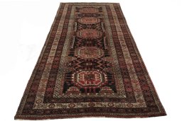 Surface texture of 2000s Hamedan rug with natural Wool and intricate pattern
