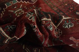 Corner detail of 2000s Hamedan rug showing border pattern and Wool pile