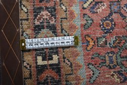Close-up detail of 2000s Hamedan rug from Iran / Persia showing Wool weave