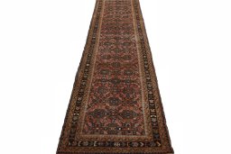 Surface texture of 2000s Hamedan rug with natural Wool and intricate pattern