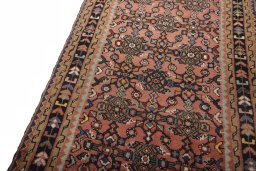 Backside of handmade 2000s Hamedan rug showing knot structure and weave density