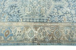 Corner detail of 1950s Hamedan rug showing border pattern and Wool pile