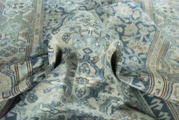 Surface texture of 1950s Hamedan rug with natural Wool and intricate pattern