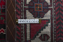 Close-up detail of 2000s Hamedan rug from Iran / Persia showing Wool weave