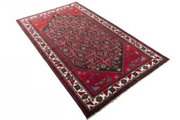 Close-up detail of 2000s Hamedan rug from Iran / Persia showing Wool weave