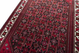 Backside of handmade 2000s Hamedan rug showing knot structure and weave density