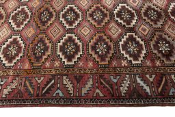 Close-up detail of 2000s Hamedan rug from Iran / Persia showing Wool weave