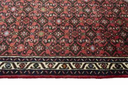 Close-up detail of New Hamedan rug from Iran / Persia showing Wool weave