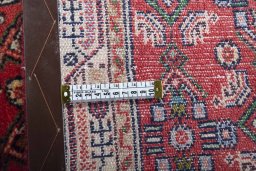 Close-up detail of 2000s Hamedan rug from Iran / Persia showing Wool weave