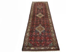 Surface texture of 2000s Hamedan rug with natural Wool and intricate pattern