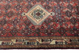 Close-up detail of 2000s Hamedan rug from Iran / Persia showing Wool weave