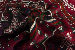 Corner detail of 2000s Hamedan rug showing border pattern and Wool pile