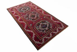 Close-up detail of 2000s Hamedan rug from Iran / Persia showing Wool weave