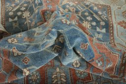 Surface texture of 1950s Hamedan rug with natural Wool and intricate pattern
