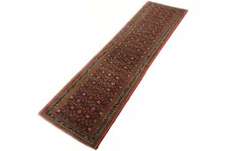 Corner detail of New Hamedan rug showing border pattern and Wool pile