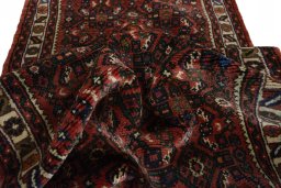 Corner detail of New Hamedan rug showing border pattern and Wool pile