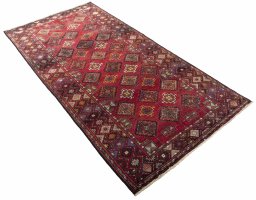 Close-up detail of 1970s Hamedan rug from Iran / Persia showing Wool weave