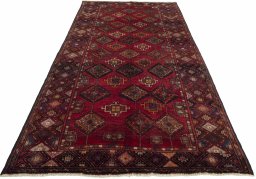 Surface texture of 1970s Hamedan rug with natural Wool and intricate pattern