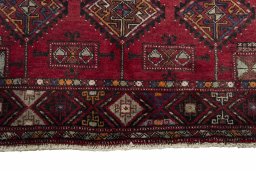 Close-up detail of 1970s Hamedan rug from Iran / Persia showing Wool weave