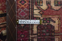 Close-up detail of 1970s Hamedan rug from Iran / Persia showing Wool weave