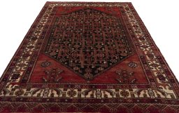 Surface texture of 1970s Hamedan rug with natural Wool and intricate pattern