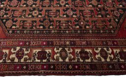 Close-up detail of 1970s Hamedan rug from Iran / Persia showing Wool weave