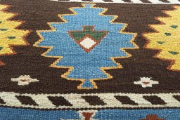 Backside of handmade New Hamedan rug showing knot structure and weave density