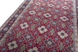 Backside of handmade New Hamedan rug showing knot structure and weave density