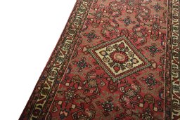 Backside of handmade New Hamedan rug showing knot structure and weave density